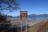 Ashokan Reservoir during a serious drought (57% capacity). Many believe the remains of former towns are visible during such droughts.