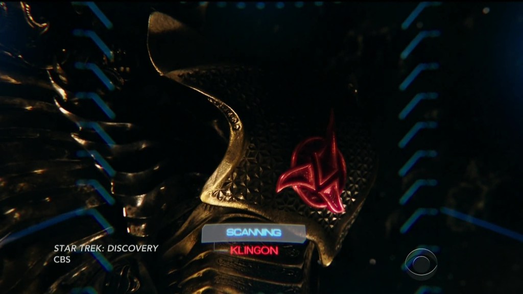 Burnham discovering the Klingon crest